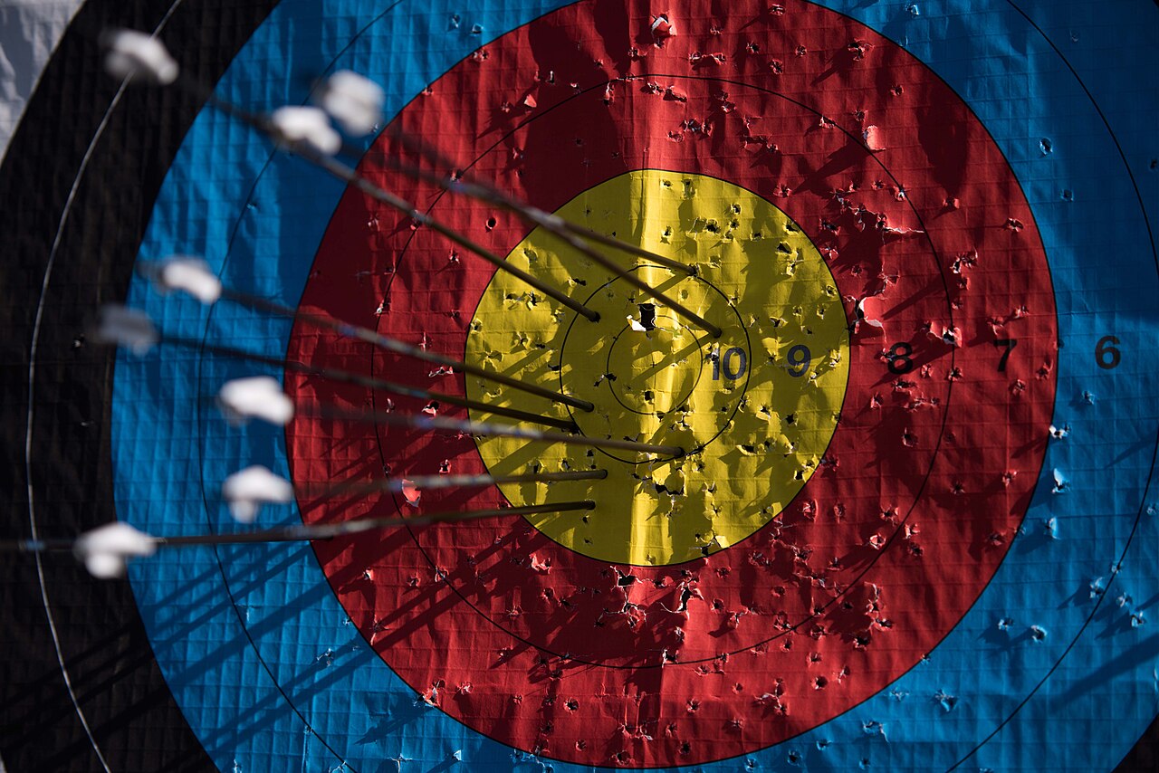 Archery target with arrows